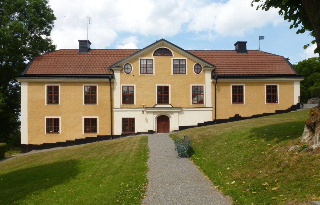 Gul herrgårdsbyggnad